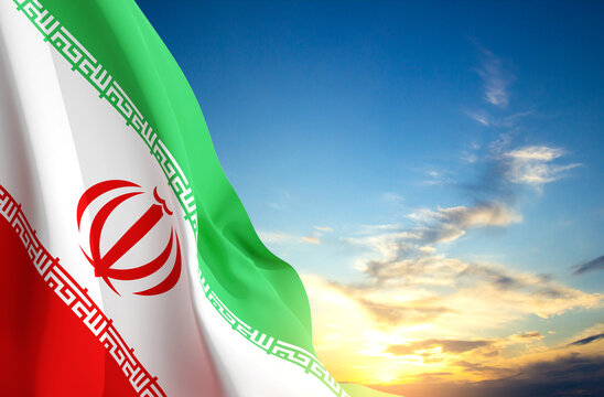 Flag of Iran against the sunset. Patriotic background