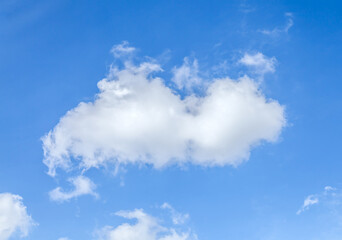 Big beautiful white cloud on the blue sky - 784358260