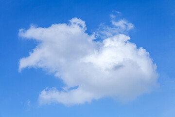 Big beautiful white cloud on the blue sky - 784358281