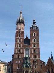 Fototapeta na wymiar Vertical shot of Saint Mary's Basilica in Krakow, Poland