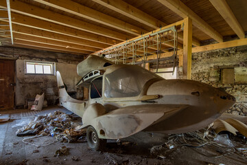 Bird without wings | Partially dismantled small aircraft left behind in abandoned farm