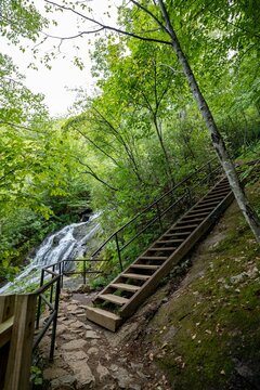Staircase and the beautiful Crabtree Falls surrounded by trees  in Nelson County Virginia