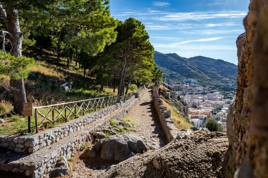Beautiful view of a trail over the skyline near the water in Cefalu, Sicily, Italy