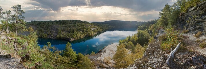 Fototapeta na wymiar Panoramic shot of the Thuringian Sea reservoir in the Saale valley surrounded by green woodsGermany