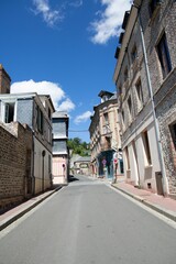 Vertical shot of a narrow street in Honfleur, France