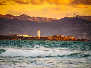 Tuinposter Sea coast and Tarifa town on skyline, Spain © anetlanda