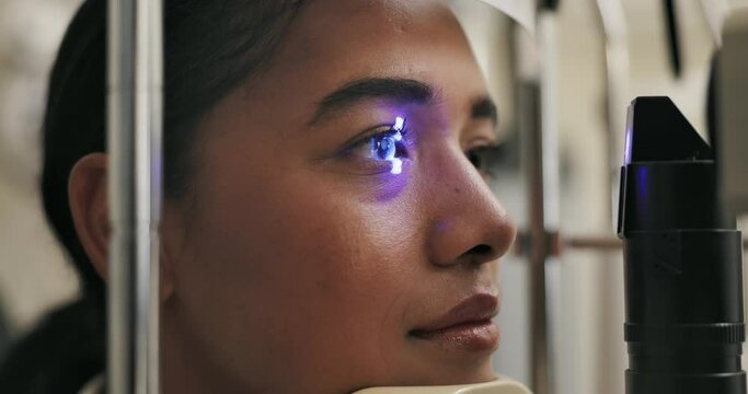 Patient, eye or light in optometry, test or medical service in healthcare, myopia or clinic. Eyeball, slit lamp or woman in glaucoma, assessment or technology to measure ocular, pressure or cornea