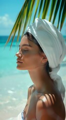 Elegant Woman Smiling with Closed Eyes under Palm Leaves, White Towel Wrapped around Head
