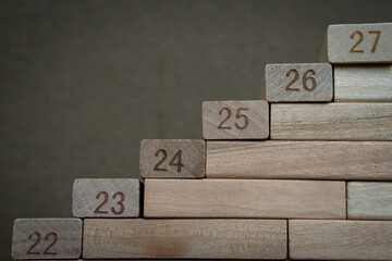 wooden blocks numbering of year 2020, 2021, 2022, 2023, 2024, 2025.... the concept of progress on the years and anticipated future. 