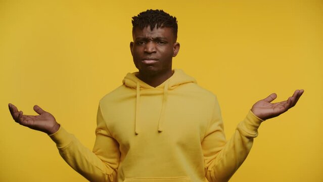 Man Expressing Doubt and Confusion on Yellow