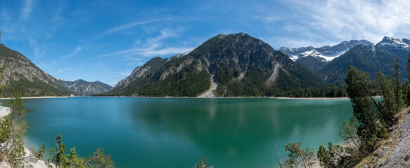Panoramic view on a beautiful mountain lake, Plansee, (plan lake), Austria, European Alps