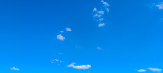 Fototapeta na wymiar Blue sky background. Natural background. Panorama sky with tiny clouds