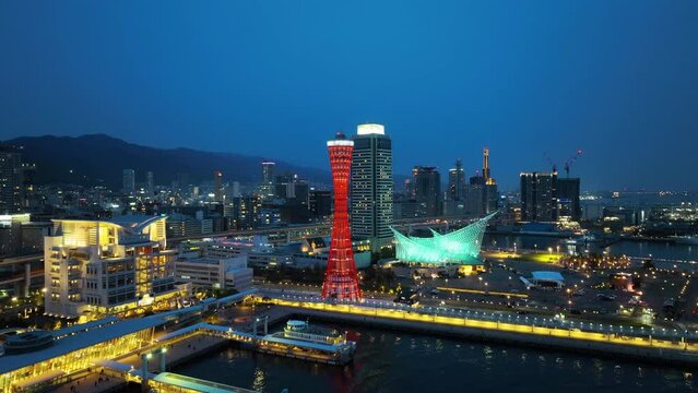 Aerial view of Cityscape and traffic at night in Kobe, Japan.