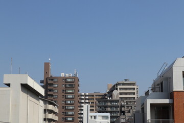 Modern urban landscape with high-rise skyscrapers and clear blue sky japanese landscape