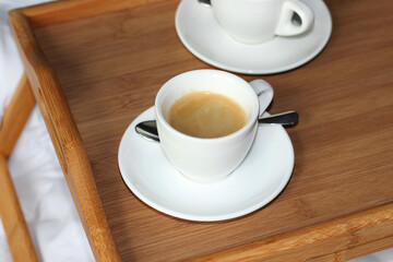 Coffee in Bed. Two Cups of Espresso Served on Wooden Tray in Bed. Perfect Morning in Bed. Waking Up.