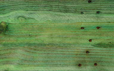 Grungy green wooden boards with rough texture, background