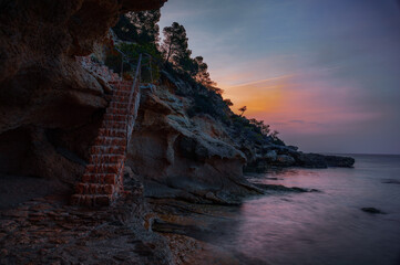 Illot beach a sunrise ,L'Ametlla de Mar, Tarragona, Spain. It is a cove with crystal clear waters...