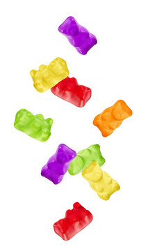 Falling Colorful jelly gummy bear, isolated on white background, full depth of field
