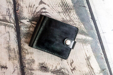 Black wallet made of genuine leather, handmade.