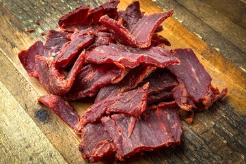 Savory Stack: Heap of Peppered Beef Jerky from Above Full Frame in 4K Photo
