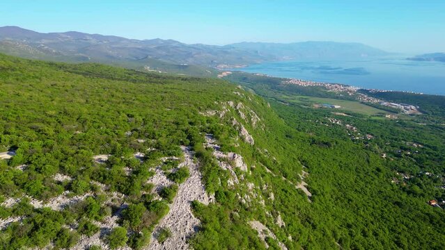 Vidikovac Slipica, also known as the Eyes of Vinodol, is a mesmerizing viewpoint situated near the village of Selce in Croatia capture by drone