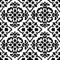Fototapeta premium A black and white patterned background with a flower design. The pattern is very intricate and detailed