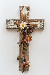 A wooden cross adorned with flowers, suitable for religious or memorial concepts