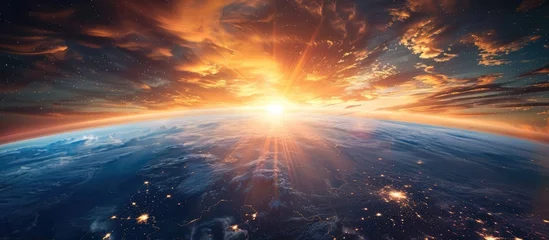Poster sunrise over the earth © Sittichok