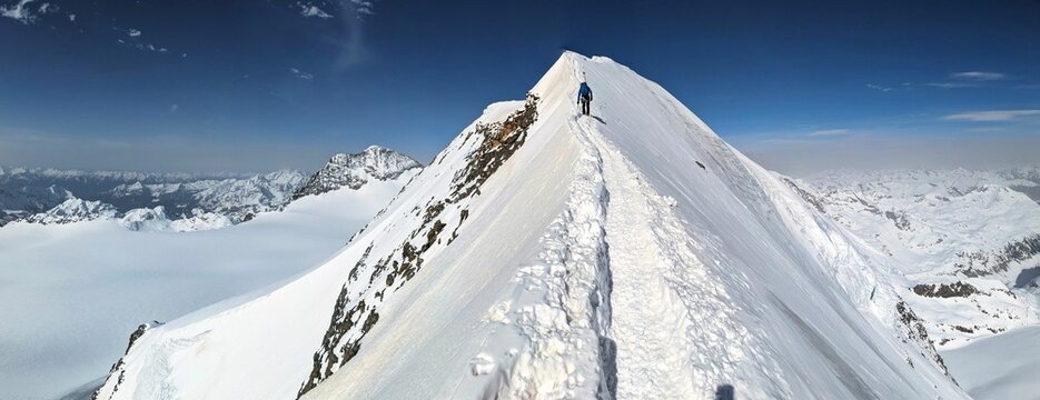 Ski tour to the Piz Pal&uuml; in the Bernina group in the canton of Graub&uuml;nden. Ski mountaineering on mountain peak Piz Pal&uuml; over glacier in a fantastic mountain world. High quality photo