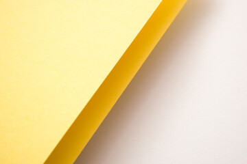 White and yellow diagonally divided background