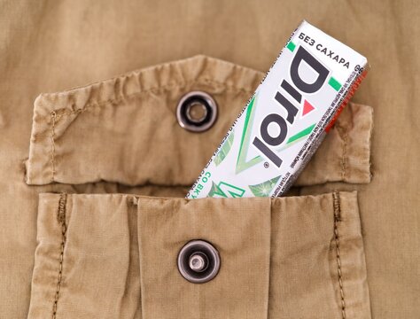 Tambov, Russian Federation - December 20, 2023 A pack of Dirol chewing gum in a beige jacket pocket