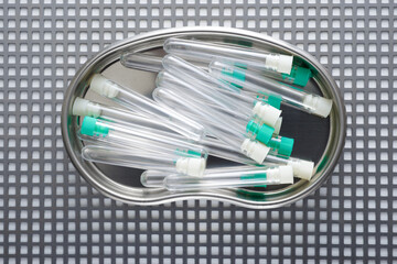 Plastic test tubes on a metal tray - 784497413
