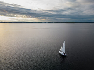 Aerial view of people sailing on the lake in Finland