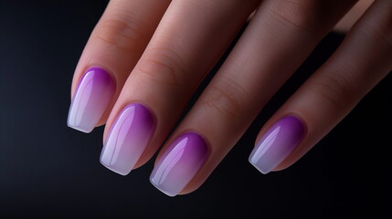 Stylish short purple and white ombre manicure on a female hand, perfect for modern beauty trends and nail art inspiration
