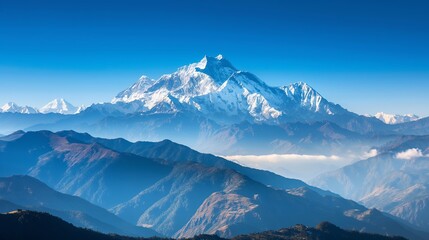 Obraz premium capped mountain range against a clear, blue sky