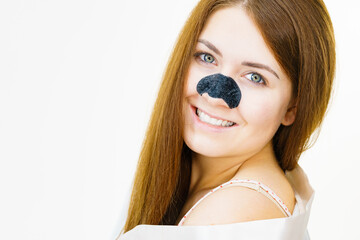 Woman with nose mask pore strips - 784508627