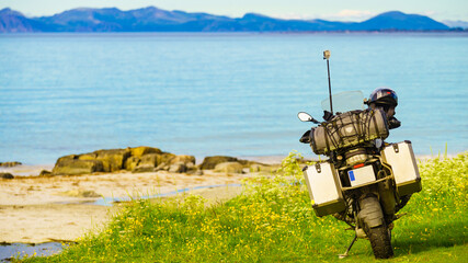 Motorcycle on sea shore - 784512489