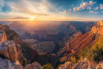 The sun is setting over the Grand Canyon