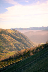 Mountainous valley at sunrise.