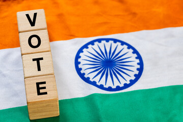India Vote, Concept, Word Vote written on wooden blocks inside the Indian flag - 784533049
