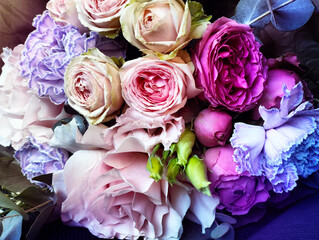 Mixed colorful flowers background. Vibrant colors of mixed flowers backdrop