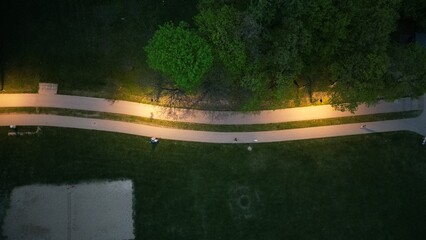 view of the dark path in the park from above Pola Mokotowskie
