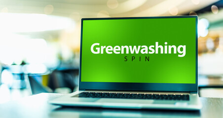 Laptop computer displaying the sign of Greenwashing