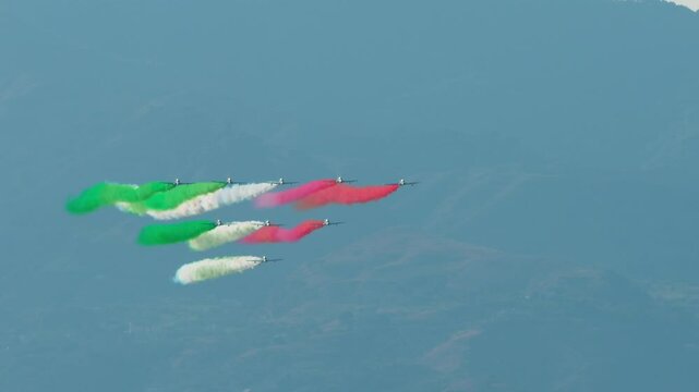 Tricolor Arrows Planes acrobatic making Italian flag with smoke