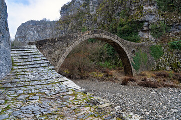View of the traditional stone Kokkorou bridge near the village of Kipi in Zagori of Epirus, Greece.