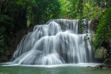 Beautiful deep forest waterfall in Thailand - 784575224