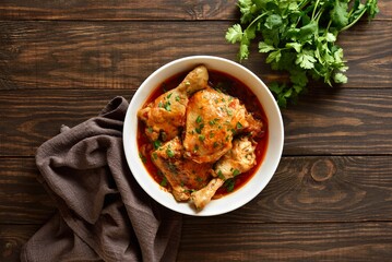 Georgian chicken stew with tomatoes and herbs