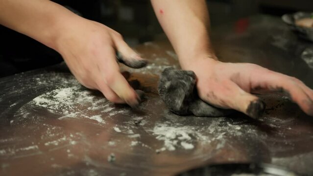 Chef Making The Italian Black Ink Cuttlefish Dough At Restaurant