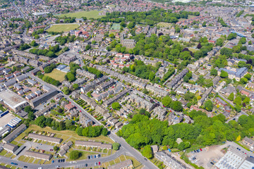 Aerial photo of the village of Pudsey in Leeds West Yorkshire in the UK, showing a typical British...