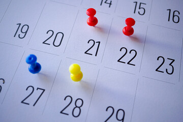 Drawing pin on the calendar, days of the month